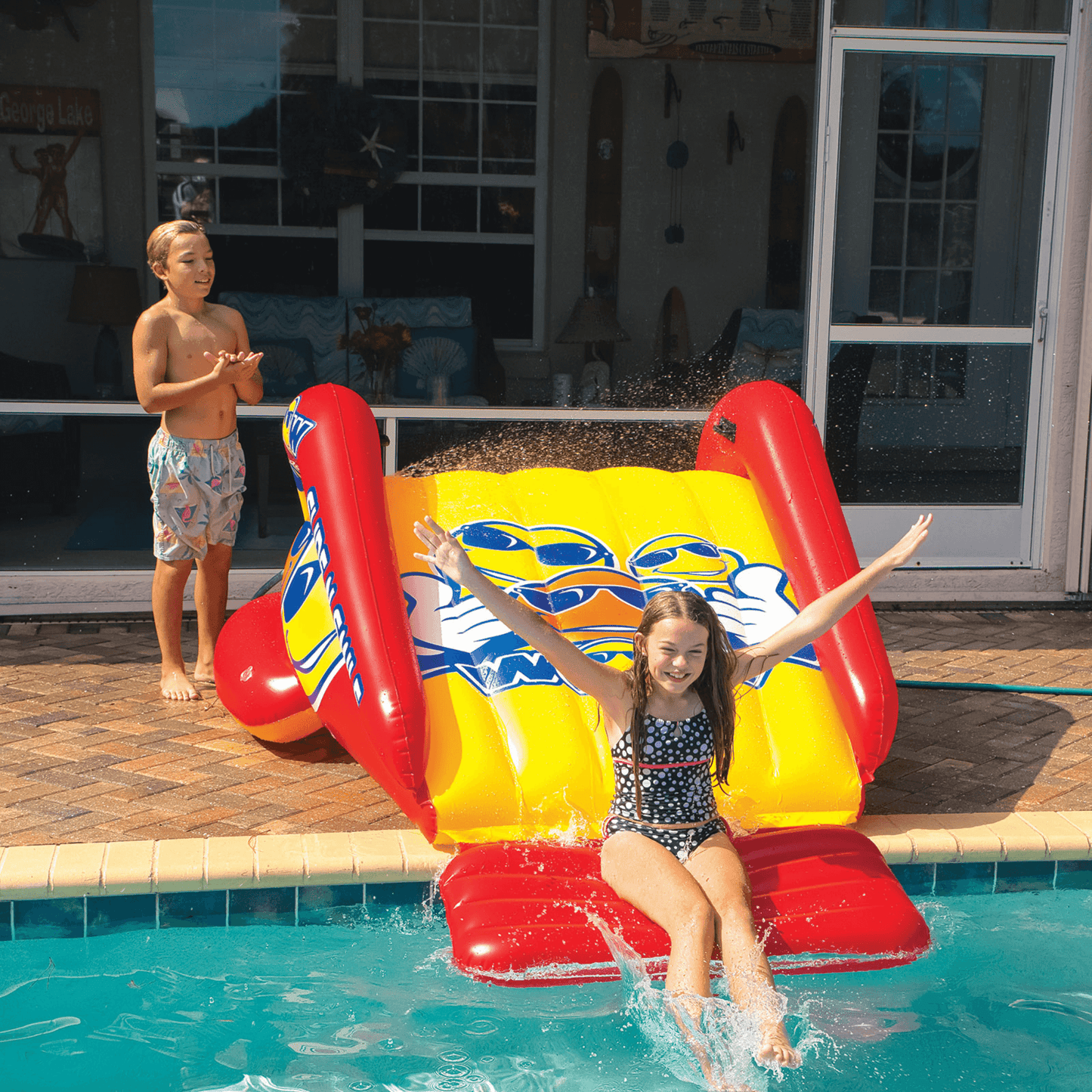 WOW Watersports Slide N Smile Inflatable Pool Slide with Sprinklers